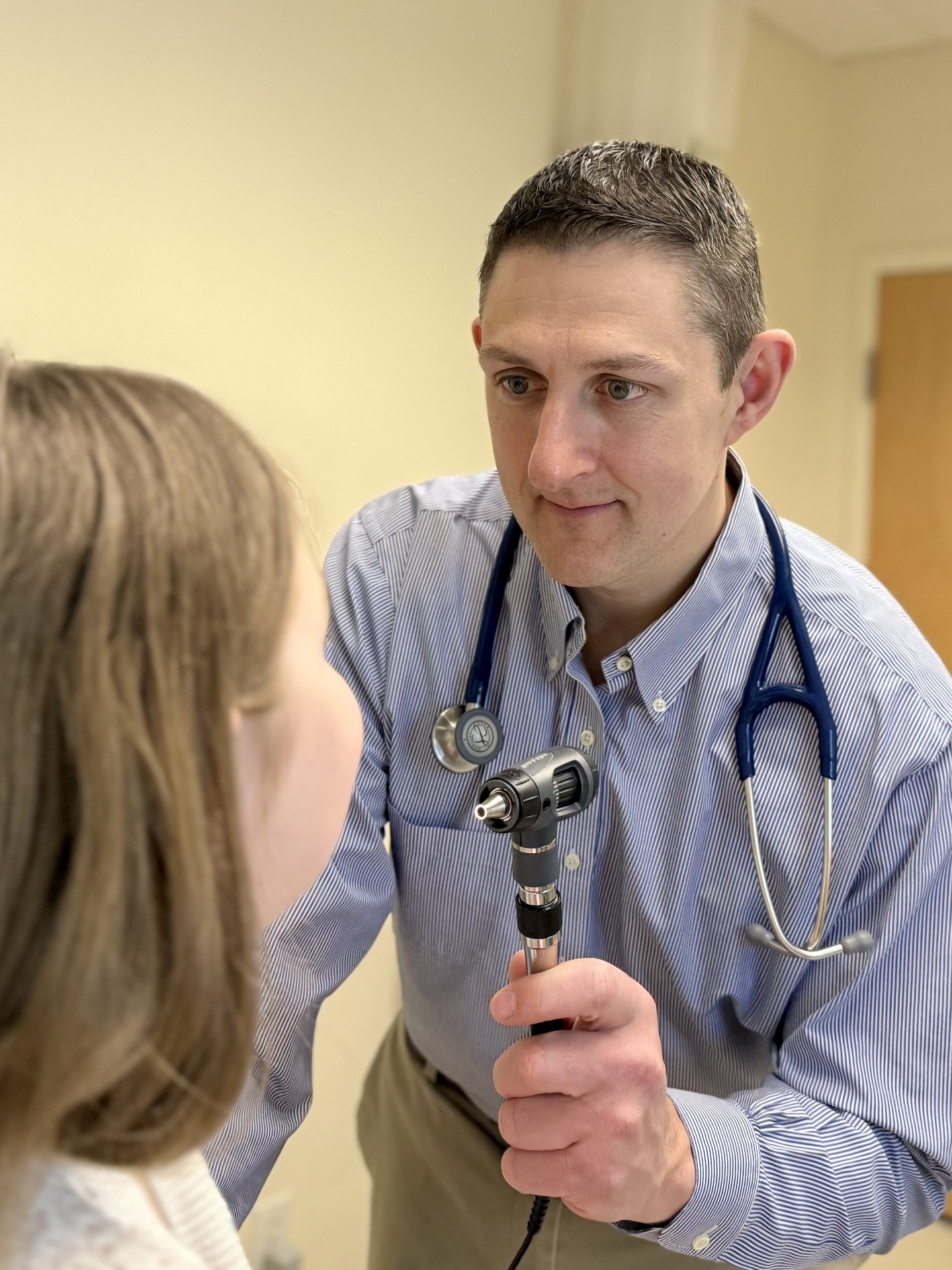 Dr. Jonathan Snyder examining a patient
